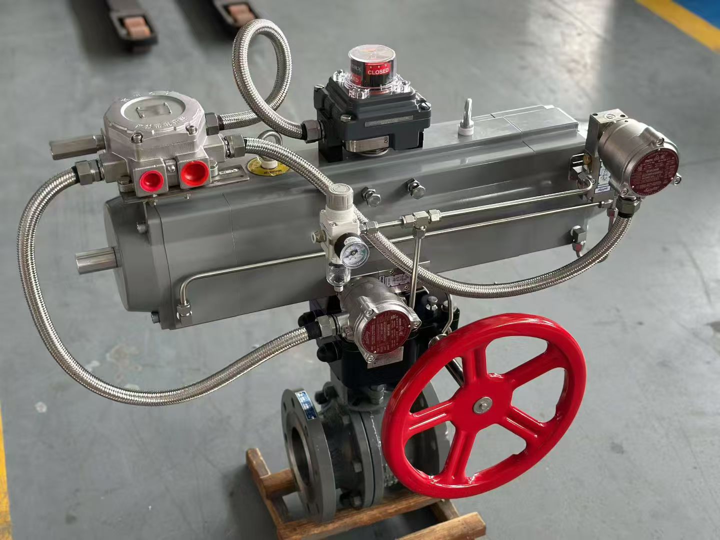 Typical pneumatic two-stage ball valve assembly with three-stage actuator, limit switches and solenoid valve manifold
